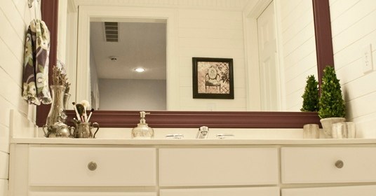 Updated girls bathroom with wood plank walls