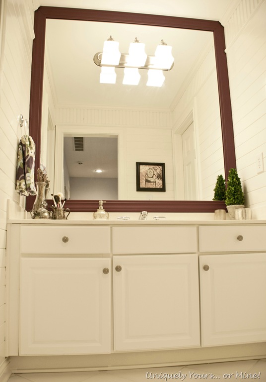 Updated girls bathroom with wood plank walls