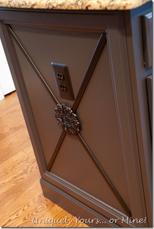 Gray black painted kitchen island with added molding