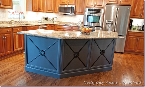 Gray black painted kitchen island with added molding