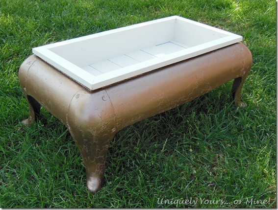 upcycled antique iron stove base into planter