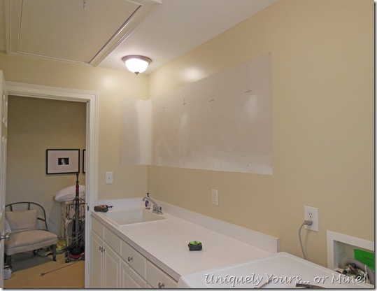 Removing upper cabinets from wall