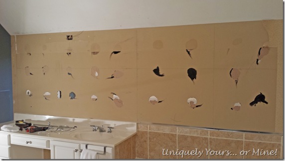 Repairing wall behind glued on mirror