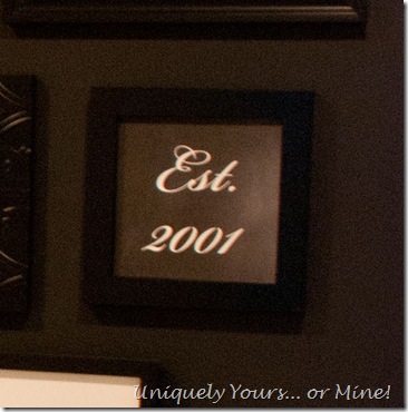 Gallery wall family photo wall black accent wall