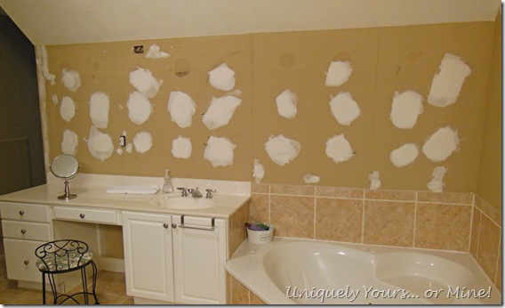 Repairing wall behind glued on mirror