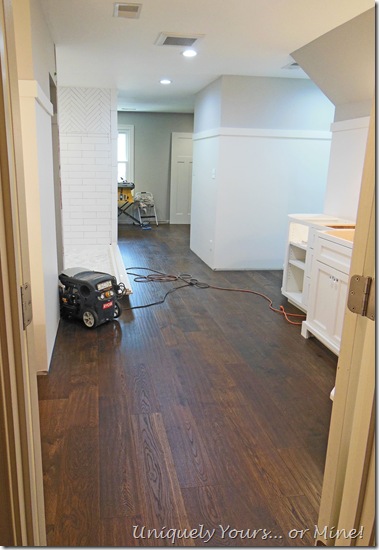Engineered oak wood flooring in master bathroom