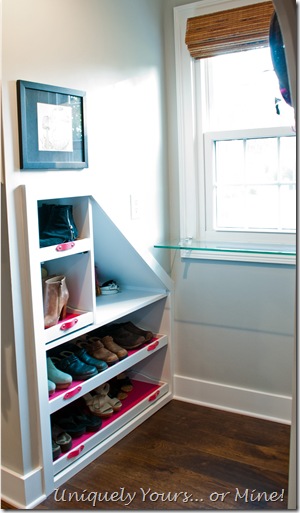 Dormer window space built in shoe shelves in knee wall