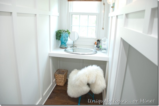 Custom built in makeup vanity in dormer window space