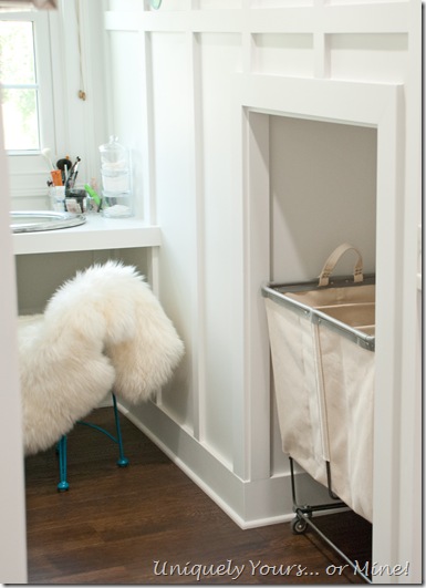 Built in laundry basket space in knee wall