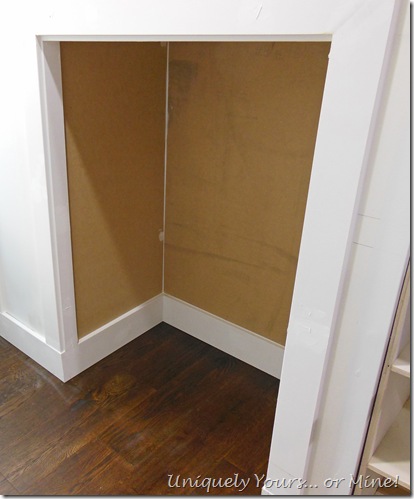 Using knee wall space for built in laundry basket