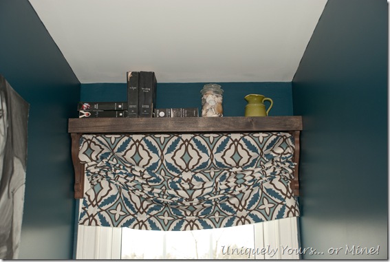 Blackout Roman shade with shelf above