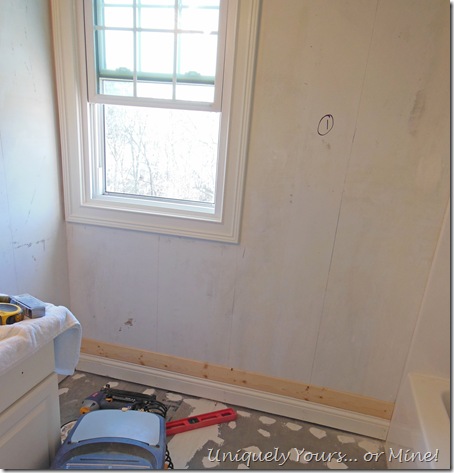 installing wood wall planks in bathroom