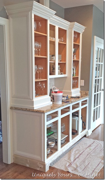 adding feet and decorative molding to cabinets