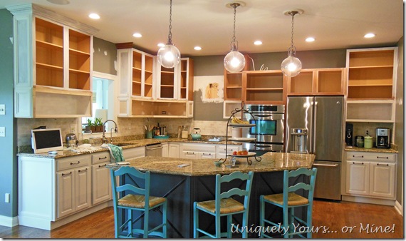 Raising kitchen cabinets and adding open cabinets below