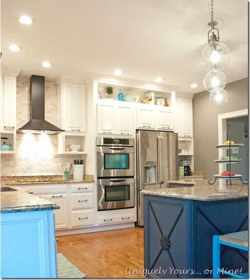 Final stage of DIY kitchen remodel, raised kitchen cabinets, open cabinetry, painted cabinets