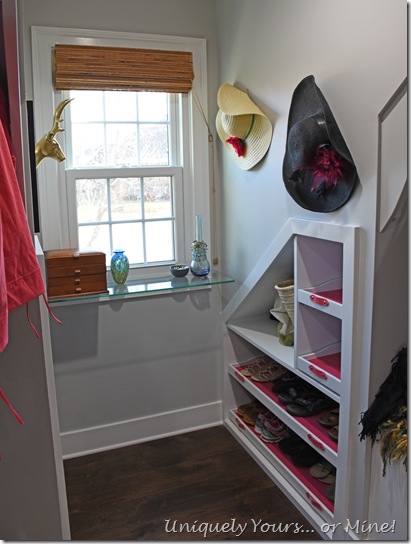 Custom built-in shoe shelves in renovated closet turned dressing room