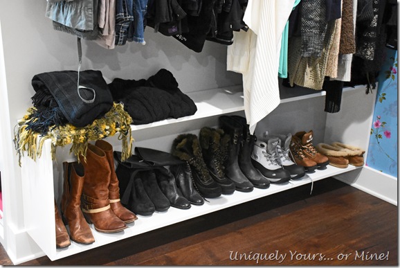Custom hanging boot cabinet in renovated closet turned dressing room